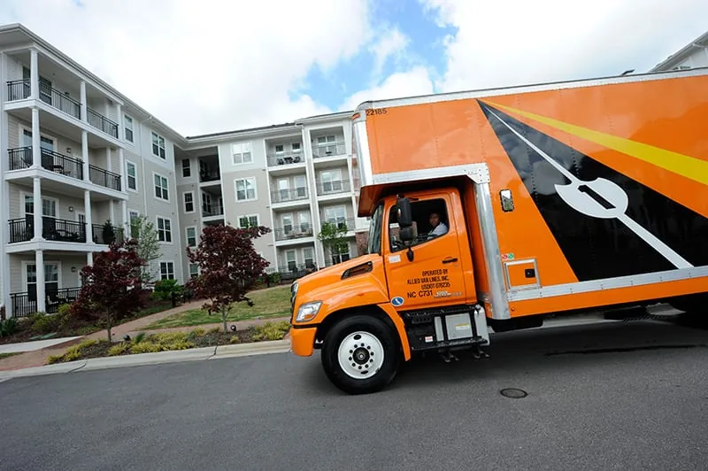 Allied moving truck from Allegheny Valley Transfer parked outside a Pittsburgh apartment building during a local move