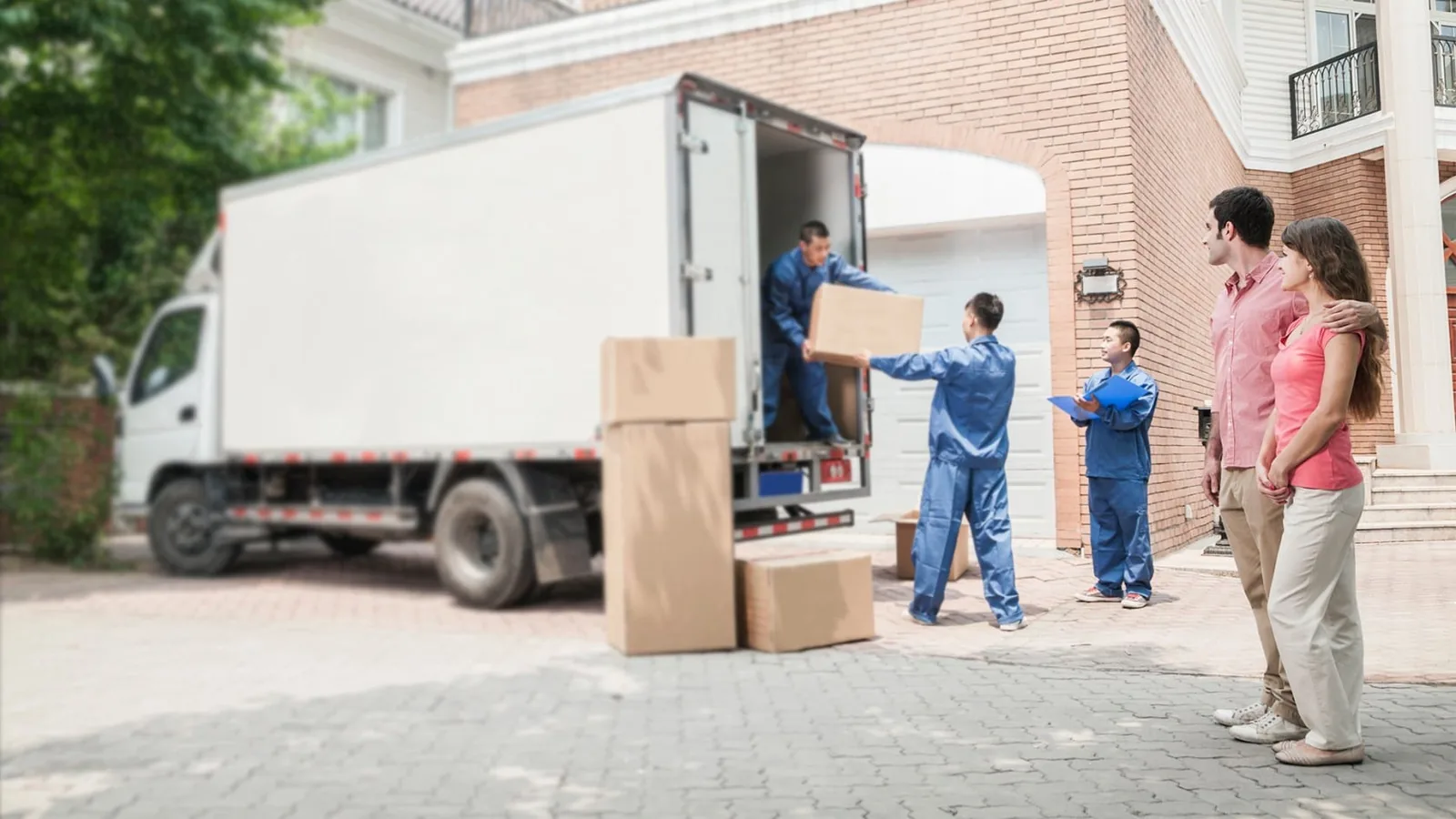 Allegheny Valley Transfer movers loading a relocating family’s belongings into the truck