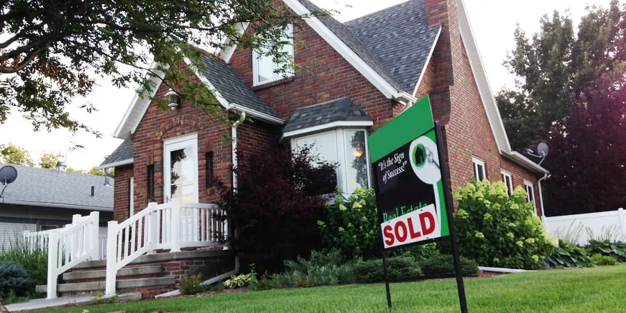 A sold sign in front of a Pittsburgh home ready for moving day